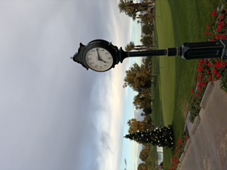 Bermuda Dunes putting green, Christmas decorations and clubhouse clock